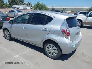 2014 Toyota Prius One with VIN JTDKDTB38E1061202, listed as a IAAI auction lot 42044747 with 133,409 mi miles and . Bid and sale history available at DreamBid. Image 3.