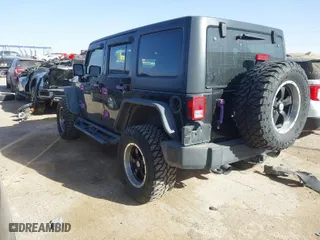 2013 Jeep Wrangler Unlimited Sport with VIN 1C4BJWDG9DL569109, listed as a IAAI auction lot 41207715 with 120,800 mi miles. Bid and sale history available at carsss.com. Image 3.