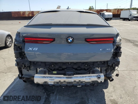 2022 BMW X6 xDrive40i z VIN 5UXCY6C01N9M95573, wystawiony jako Copart lot #54049805 z przebiegiem 24 031 mil mil oraz Szkoda całkowita • Salvage title. Historia ofert i sprzedaży dostępna na DreamBid. Obrazek 6.