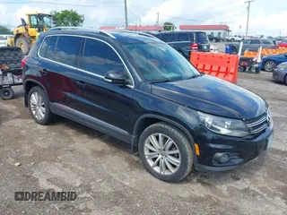2015 Volkswagen Tiguan SE with VIN WVGAV7AX7FW510549, listed as a IAAI auction lot 42652715 with 152,488 mi miles and . Bid and sale history available at DreamBid. Image 1.