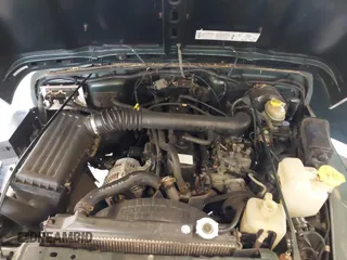 2000 Jeep Wrangler Sport with VIN 1J4FA49S8YP780104, listed as a IAAI auction lot 42095731 with Not provided miles and . Bid and sale history available at DreamBid. Image 10.