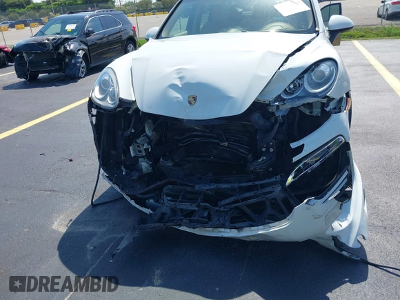 2014 Porsche Cayenne with VIN WP1AA2A20ELA02638, listed as a IAAI auction lot 42349570 with 113,355 mi miles and . Bid and sale history available at DreamBid. Image 6.