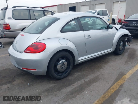 2013 Volkswagen Beetle with VIN 3VWHX7ATXDM658134, listed as a IAAI auction lot 42097779 with 47,901 mi miles and . Bid and sale history available at DreamBid. Image 4.