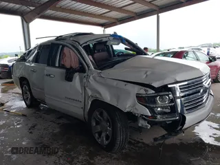 2019 Chevrolet Suburban Premier with VIN 1GNSKJKJ2KR354283, listed as a IAAI auction lot 39548082 with Not Provided miles and . Bid and sale history available at DreamBid. Image 1.