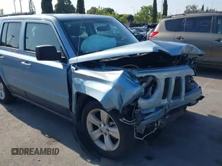 2014 Jeep Patriot Latitude with VIN 1C4NJPFB5ED536401, listed as a IAAI auction lot 42383752 with 68,657 mi miles and . Bid and sale history available at DreamBid. Image 6.
