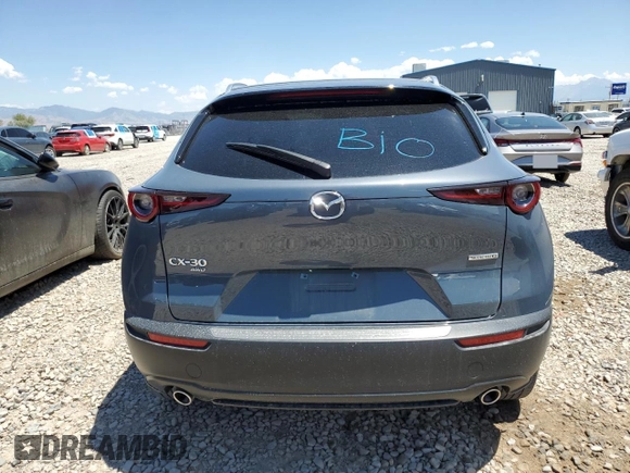 2023 Mazda CX-30 S Carbon Edition z VIN 3MVDMBCM2PM524384, wystawiony jako Copart lot #62699155 z przebiegiem 25 765 mil mil oraz Szkoda całkowita • Salvage title. Historia ofert i sprzedaży dostępna na DreamBid. Obrazek 6.