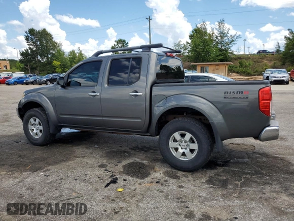 2008 Nissan Frontier SE with VIN 1N6AD07UX8C406795, listed as a Copart auction lot 61303185 with 145,742 mi miles and Salvage title. Bid and sale history available at DreamBid. Image 2.