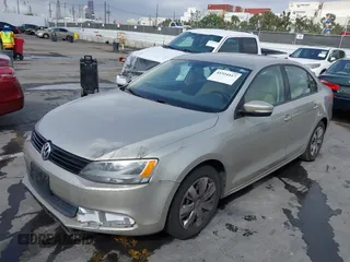 2014 Volkswagen Jetta Sedan SE w/Connectivity with VIN 3VWD17AJ9EM247789, listed as a IAAI auction lot 41934417 with 190,975 mi miles. Bid and sale history available at carsss.com. Image 2.