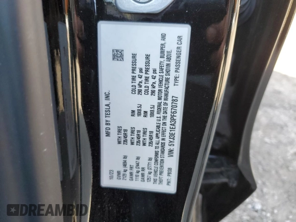 2023 Tesla Model 3 with VIN 5YJ3E1EA3PF670787, listed as a Copart auction lot 49070865 with 13,489 mi miles and Salvage title. Bid and sale history available at DreamBid. Image 12.