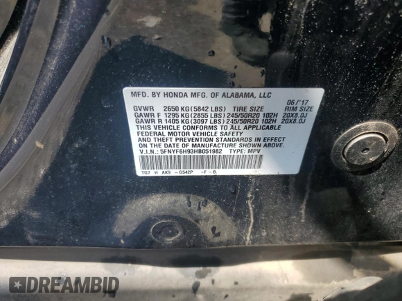 2017 Honda Pilot Touring z VIN 5FNYF6H93HB051982, wystawiony jako Copart lot #53390535 z przebiegiem Nie podano mil oraz Szkoda całkowita • Salvage title. Historia ofert i sprzedaży dostępna na DreamBid. Obrazek 14.