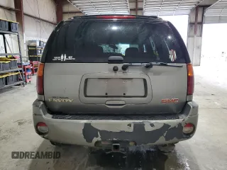 2005 GMC Envoy SLE с VIN 1GKDS13S752274178, выставлен на аукционе Copart как лот 55289005 с пробегом 199 378 миль миль и Списание • Salvage title. История ставок и продаж доступна на DreamBid. Изображение 6.