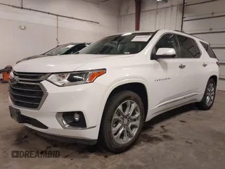 2021 Chevrolet Traverse Premier with VIN 1GNEVKKW8MJ259346, listed as a IAAI auction lot 41810312 with 80,474 mi miles. Bid and sale history available at carsss.com. Image 2.