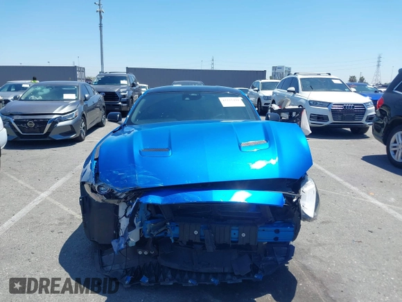 2021 Ford Mustang EcoBoost with VIN 1FA6P8TH0M5119073, listed as a IAAI auction lot 42225499 with 52,165 mi miles and . Bid and sale history available at DreamBid. Image 12.