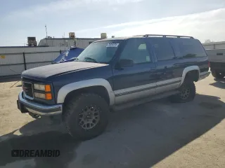 1997 GMC Suburban with VIN 1GKFK16R6VJ758513, listed as a Copart auction lot 75034574 with 181,873 mi miles and Salvage Title. Bid and sale history available at carsss.com. Image 1.