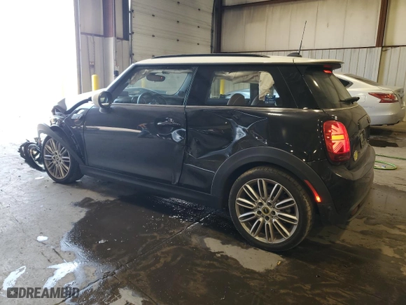 2023 MINI Hardtop 2 Door Cooper SE Signature with VIN WMW13DJ00P2T90613, listed as a Copart auction lot 71626914 with 19,681 mi miles and Salvage Title. Bid and sale history available at carsss.com. Image 2.
