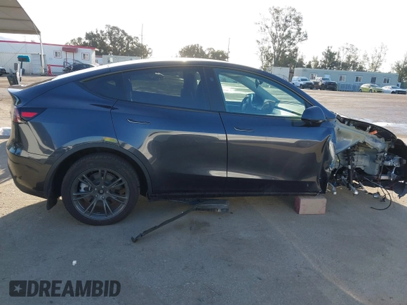2024 Tesla Model Y with VIN 7SAYGDED5RF103983, listed as a IAAI auction lot 41933836 with 11,398 mi miles and . Bid and sale history available at DreamBid. Image 13.