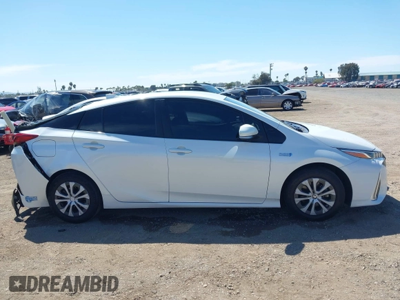 2021 Toyota Prius LE with VIN JTDKAMFP2M3184900, listed as a IAAI auction lot 42014569 with 81,563 mi miles and . Bid and sale history available at DreamBid. Image 13.