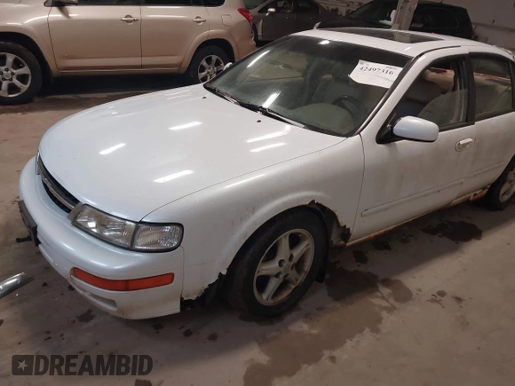 1998 Nissan Maxima GXE z VIN JN1CA21A9WM805626, wystawiony jako IAAI lot #42497316 z przebiegiem 195 991 mil mil oraz . Historia ofert i sprzedaży dostępna na DreamBid. Obrazek 2.
