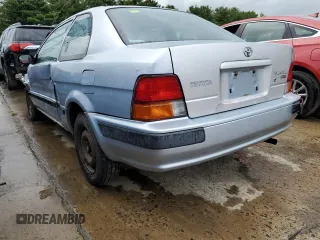 1997 Toyota Tercel CE z VIN JT2AC52L1V0227973, wystawiony jako Copart lot #56672512 z przebiegiem 301 799 mil mil oraz Szkody całkowita. Historia ofert i sprzedaży dostępna na DreamBid. Obrazek 3.