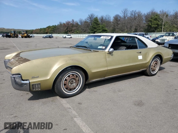 1967 Oldsmobile Toronado with VIN 396877M621130, listed as a Copart auction lot 71016094 with 17,887 mi miles and Salvage Title. Bid and sale history available at DreamBid. Image 1.
