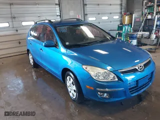2010 Hyundai Elantra Touring SE with VIN KMHDC8AE8AU077884, listed as a IAAI auction lot 41833566 with 192,421 mi miles. Bid and sale history available at carsss.com. Image 1.