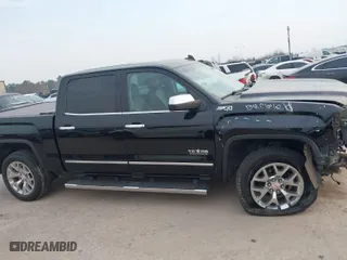 2018 GMC Sierra 1500 SLT with VIN 3GTU2NECXJG280695, listed as a IAAI auction lot 41681750 with 83,890 mi miles. Bid and sale history available at carsss.com. Image 13.