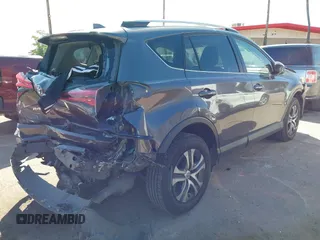 2016 Toyota RAV4 LE with VIN JTMBFREV4GJ052168, listed as a IAAI auction lot 41837564 with 73,659 mi miles. Bid and sale history available at carsss.com. Image 6.