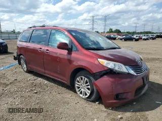 2016 Toyota Sienna XLE with VIN 5TDYK3DC5GS730870, listed as a Copart auction lot 62107505 with 131,619 mi miles and Salvage title. Bid and sale history available at DreamBid. Image 4.