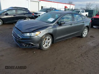 2018 Ford Fusion SE z VIN 3FA6P0HD7JR259606, wystawiony jako IAAI lot #41649797 z przebiegiem 94 094 mil mil oraz . Historia ofert i sprzedaży dostępna na DreamBid. Obrazek 2.