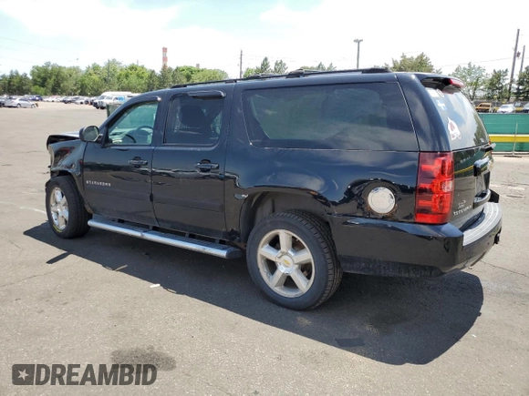 2007 Chevrolet Suburban LTZ with VIN 1GNFK16347J179019, listed as a Copart auction lot 60963795 with 243,300 mi miles and Salvage title. Bid and sale history available at DreamBid. Image 2.