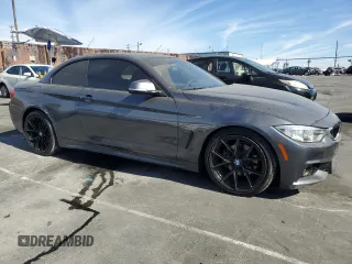 2014 BMW 4 Series 428i with VIN WBA3V7C55EP770804, listed as a Copart auction lot 79122804 with 98,890 mi miles and Salvage Title. Bid and sale history available at DreamBid. Image 4.