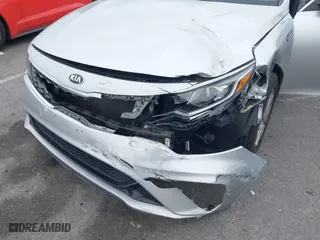 2019 Kia Optima LX with VIN 5XXGT4L3XKG285486, listed as a IAAI auction lot 41872981 with 101,981 mi miles. Bid and sale history available at carsss.com. Image 6.