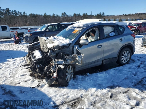 2014 Mazda CX-5 Sport with VIN JM3KE4BE2E0360024, listed as a Copart auction lot 47014035 with Not provided miles and Salvage title. Bid and sale history available at DreamBid. Image 1.