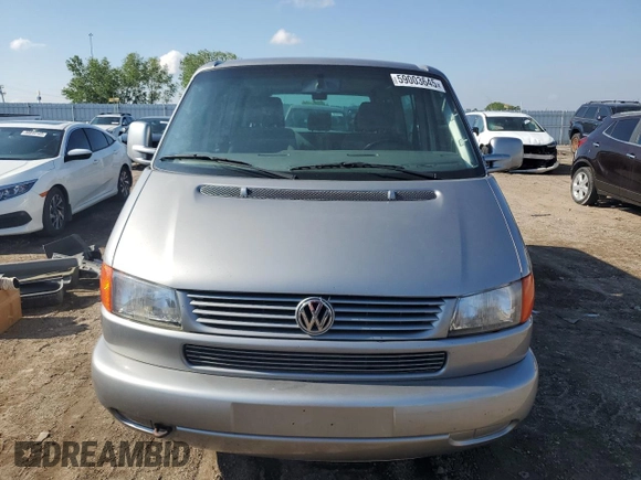 2000 Volkswagen EuroVan с VIN WV2MH4703YH013265, выставлен на аукционе Copart как лот 59003645 с пробегом Не указан миль и Списание • Salvage title. История ставок и продаж доступна на DreamBid. Изображение 5.