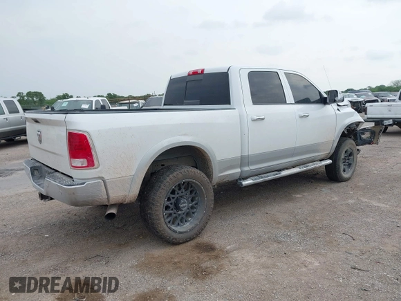 2016 Ram 2500 Laramie with VIN 3C6UR5FLXGG330005, listed as a IAAI auction lot 42045277 with 210,480 mi miles and . Bid and sale history available at DreamBid. Image 4.