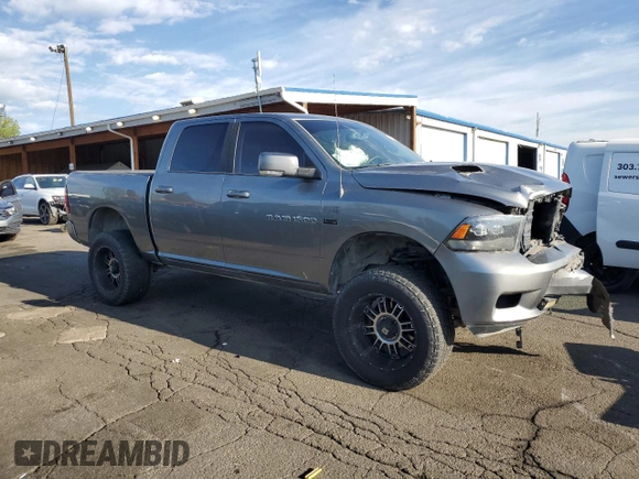 2012 Ram 1500 Sport with VIN 1C6RD7MT8CS150205, listed as a Copart auction lot 56344105 with 145,400 mi miles and Salvage title. Bid and sale history available at DreamBid. Image 4.