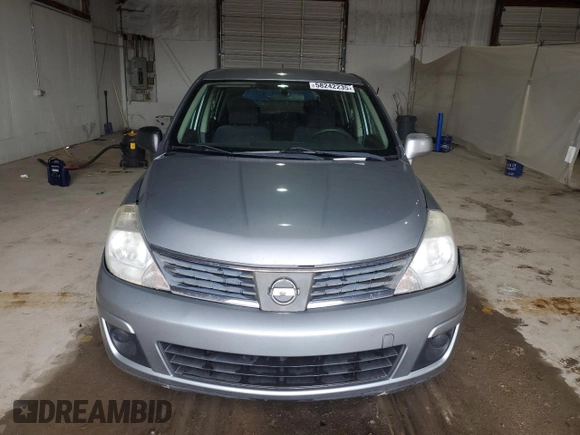 2009 Nissan Versa S with VIN 3N1BC13E59L499698, listed as a Copart auction lot 58242235 with 169,239 mi miles and Clean title. Bid and sale history available at DreamBid. Image 5.