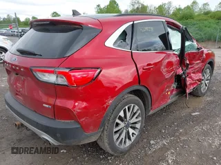 2020 Ford Escape Titanium with VIN 1FMCU9J99LUB28104, listed as a IAAI auction lot 42295278 with 73,706 mi miles and . Bid and sale history available at DreamBid. Image 4.