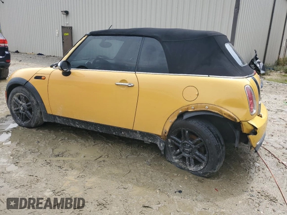 2007 MINI Convertible with VIN WMWRF33507TG17373, listed as a Copart auction lot 52818825 with 207,096 mi miles and Salvage Title. Bid and sale history available at DreamBid. Image 2.