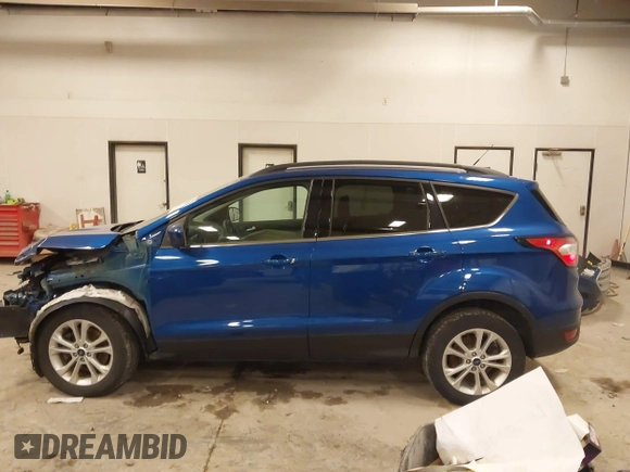 2018 Ford Escape SE with VIN 1FMCU9GD4JUA83470, listed as a IAAI auction lot 41272882 with 105,661 mi miles. Bid and sale history available at carsss.com. Image 14.