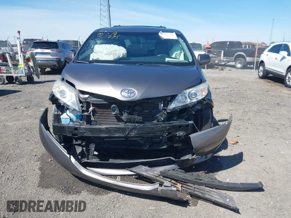 2015 Toyota Sienna XLE with VIN 5TDYK3DC4FS634937, listed as a IAAI auction lot 41869781 with 65,561 mi miles and . Bid and sale history available at carsss.com. Image 12.
