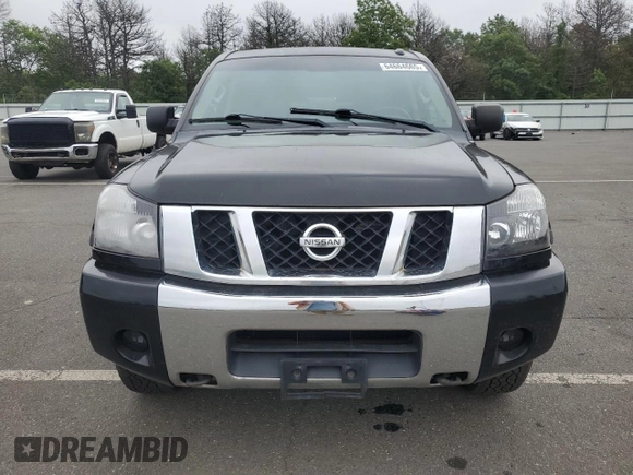 2015 Nissan Titan SV with VIN 1N6AA0EC2FN503980, listed as a Copart auction lot 64664665 with 124,589 mi miles and Clean title. Bid and sale history available at DreamBid. Image 5.