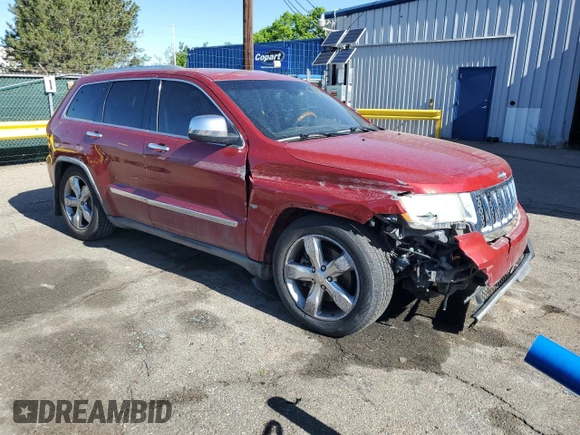 2011 Jeep Grand Cherokee Overland with VIN 1J4RR6GT8BC606688, listed as a Copart auction lot 57182295 with 100,423 mi miles and Salvage title. Bid and sale history available at DreamBid. Image 4.