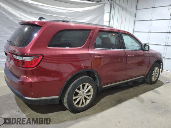 2014 Dodge Durango SXT with VIN 1C4RDJAG7EC586540, listed as a Copart auction lot 58769985 with 354,681 mi miles and Salvage title. Bid and sale history available at DreamBid. Image 3.