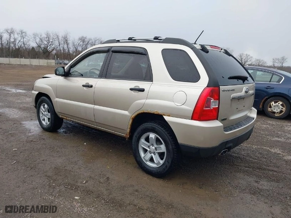 2009 Kia Sportage LX with VIN KNDJE723397628211, listed as a IAAI auction lot 41744526 with 136,811 mi miles. Bid and sale history available at carsss.com. Image 3.