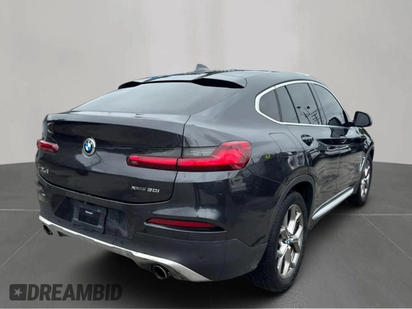 2021 BMW X4 xDrive30i with VIN 5UX2V1C06M9G72451, listed as a Copart auction lot 65089695 with 110,879 mi miles and Clean title. Bid and sale history available at DreamBid. Image 4.