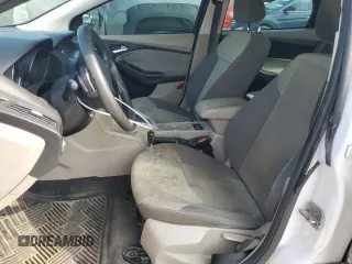 2012 Ford Focus SE z VIN 1FAHP3F2XCL310660, wystawiony jako Copart lot #60217625 z przebiegiem 208 807 mil mil oraz Szkoda całkowita • Salvage title. Historia ofert i sprzedaży dostępna na DreamBid. Obrazek 7.