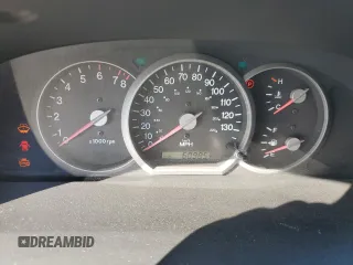 2005 Kia Sedona LX with VIN KNDUP132056685525, listed as a Copart auction lot 77790354 with 60,985 mi miles and Salvage Title. Bid and sale history available at carsss.com. Image 9.