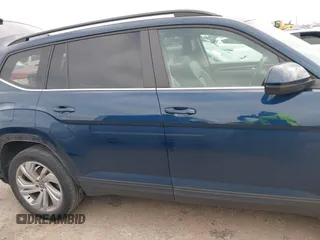2021 Volkswagen Atlas SE z VIN 1V2JR2CA3MC555490, wystawiony jako IAAI lot #41286240 z przebiegiem 89 435 mil mil oraz . Historia ofert i sprzedaży dostępna na DreamBid. Obrazek 14.