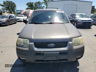 2002 Ford Escape XLT Choice with VIN 1FMYU04182KB99540, listed as a Copart auction lot 61493365 with 156,207 mi miles and Salvage title. Bid and sale history available at DreamBid. Image 5.